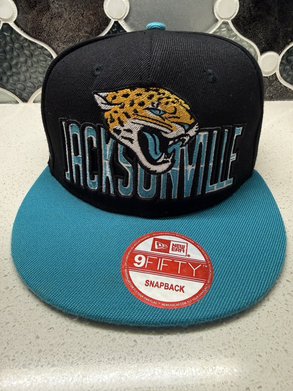 Jacksonville Jaguars New Era 9FIFTY Snapback Hat NFL Black Teal Embroidered